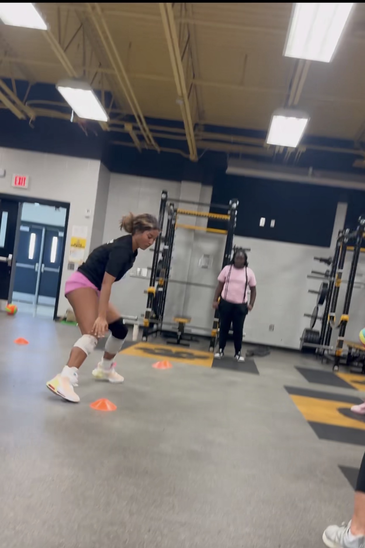Athlete working through cone footwork and change-of-direction drills