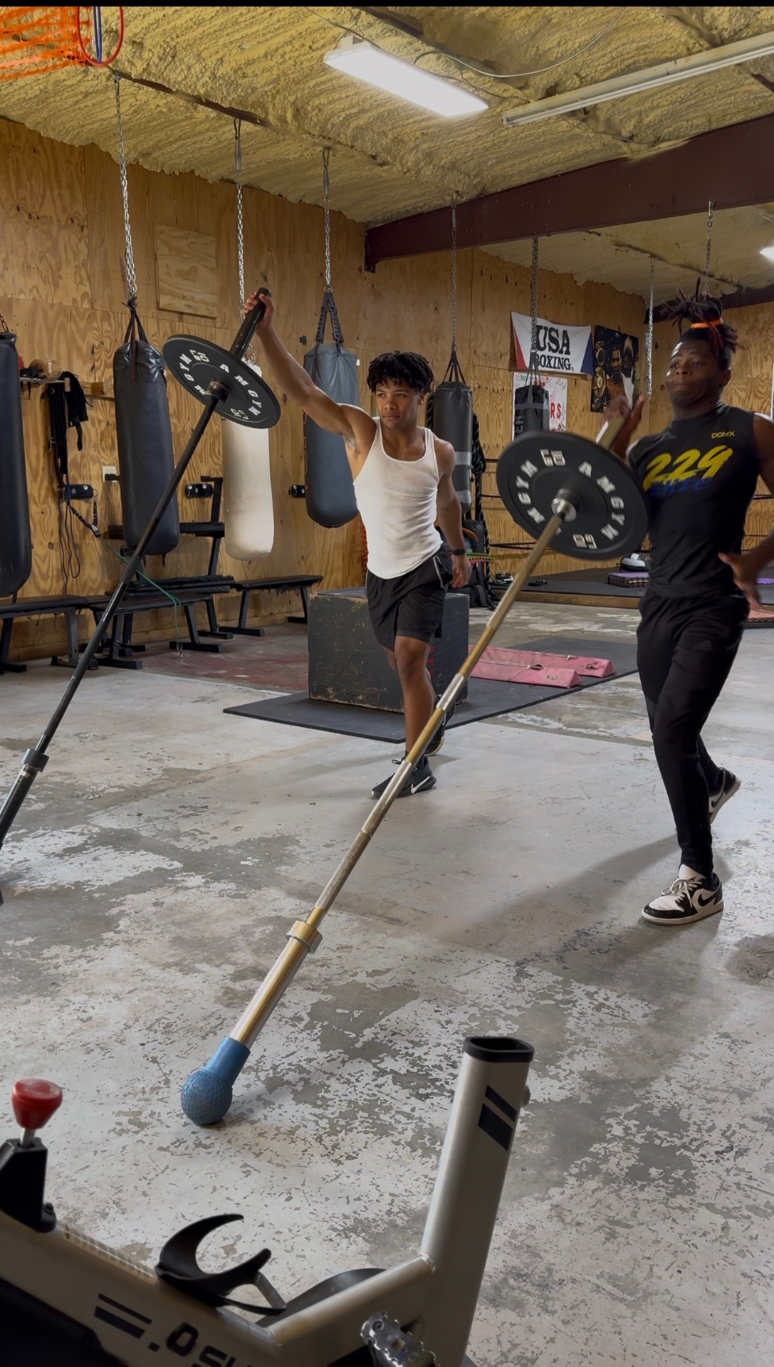 Athletes doing banded running-in-place conditioning drills